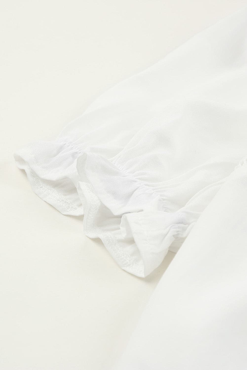 Spliced Lace Curved Hem Flounce Sleeve Top